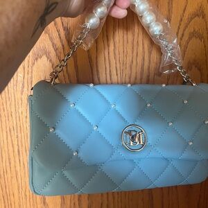 Brand new with tags, cute little powder, blue purse, Pearl detail